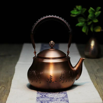 Hand Woven Lifting Beam Pear Shaped Copper Teapot