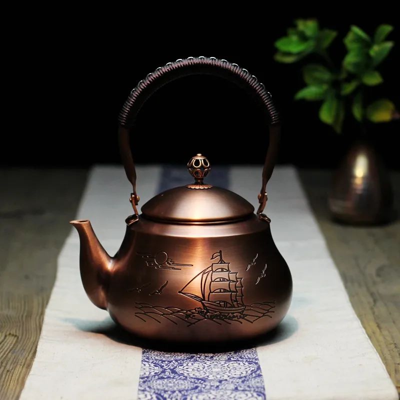 Hand Woven Lifting Beam Pear Shaped Copper Teapot
