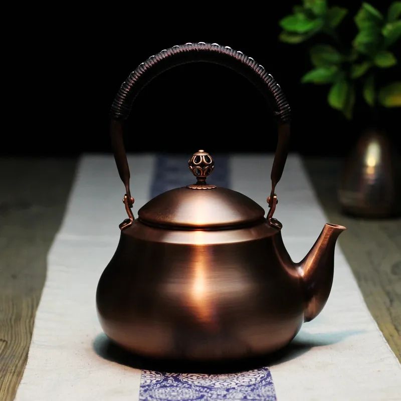 Hand Woven Lifting Beam Pear Shaped Copper Teapot
