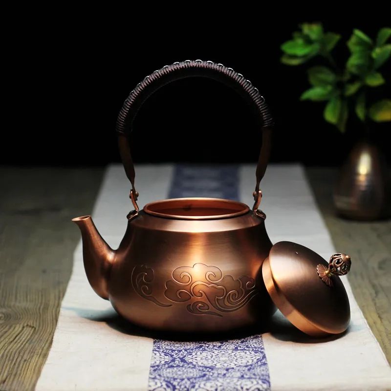 Hand Woven Lifting Beam Pear Shaped Copper Teapot