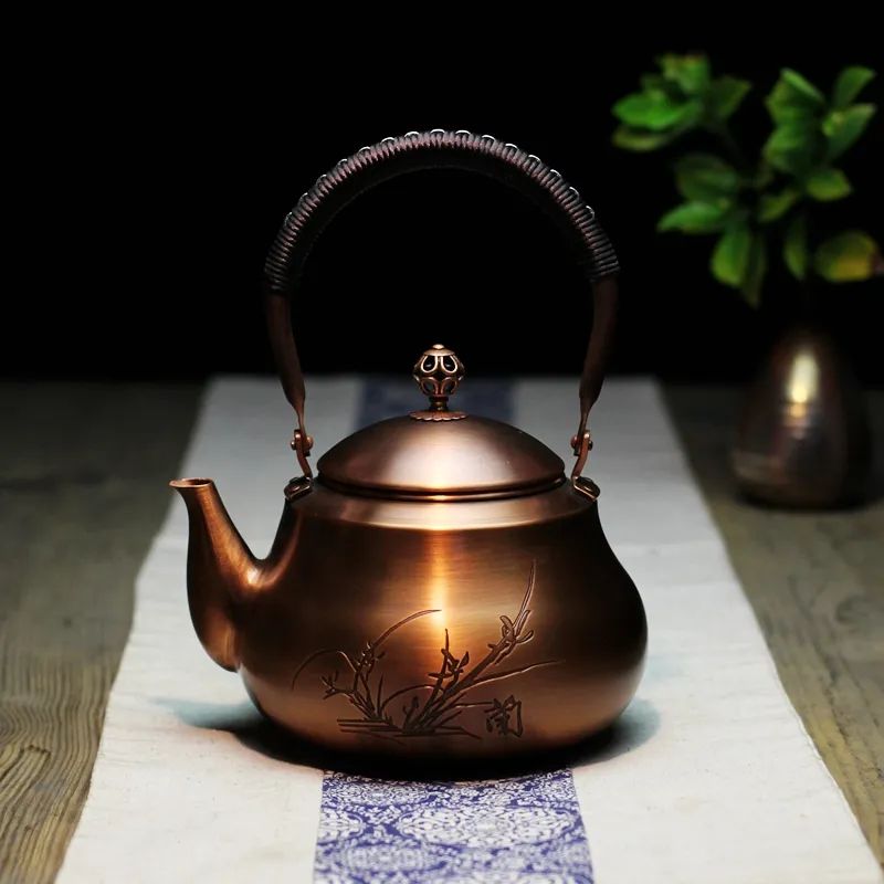 Hand Woven Lifting Beam Pear Shaped Copper Teapot