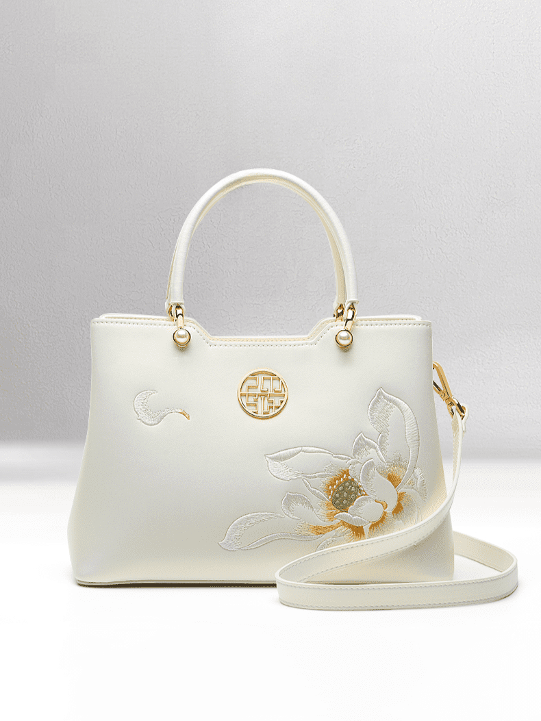 Elegant Lotus Ode Embroidered Genuine Leather Handbag