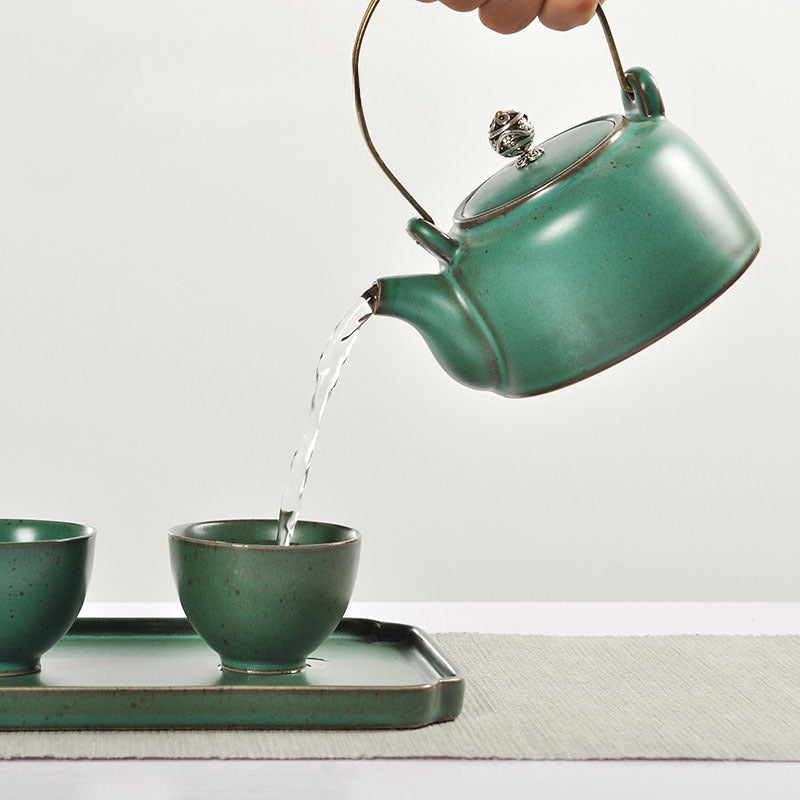 Coarse Pottery Loop-Handled Teapot