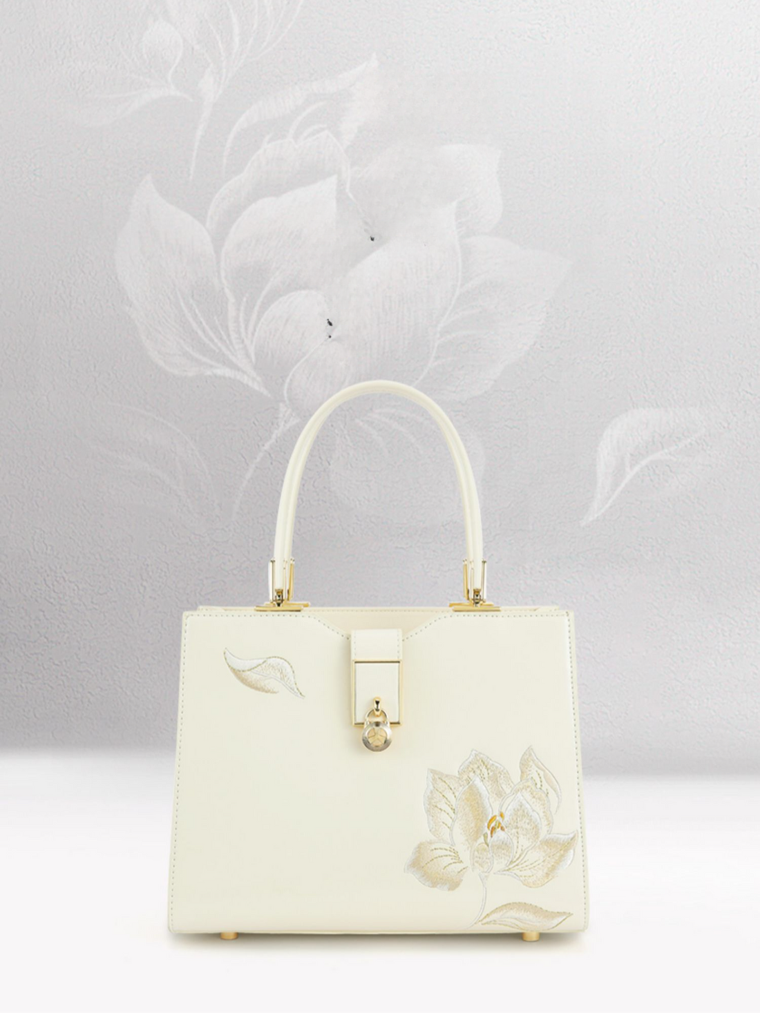 Elegant Snow Lotus Embroidered Leather Handbag