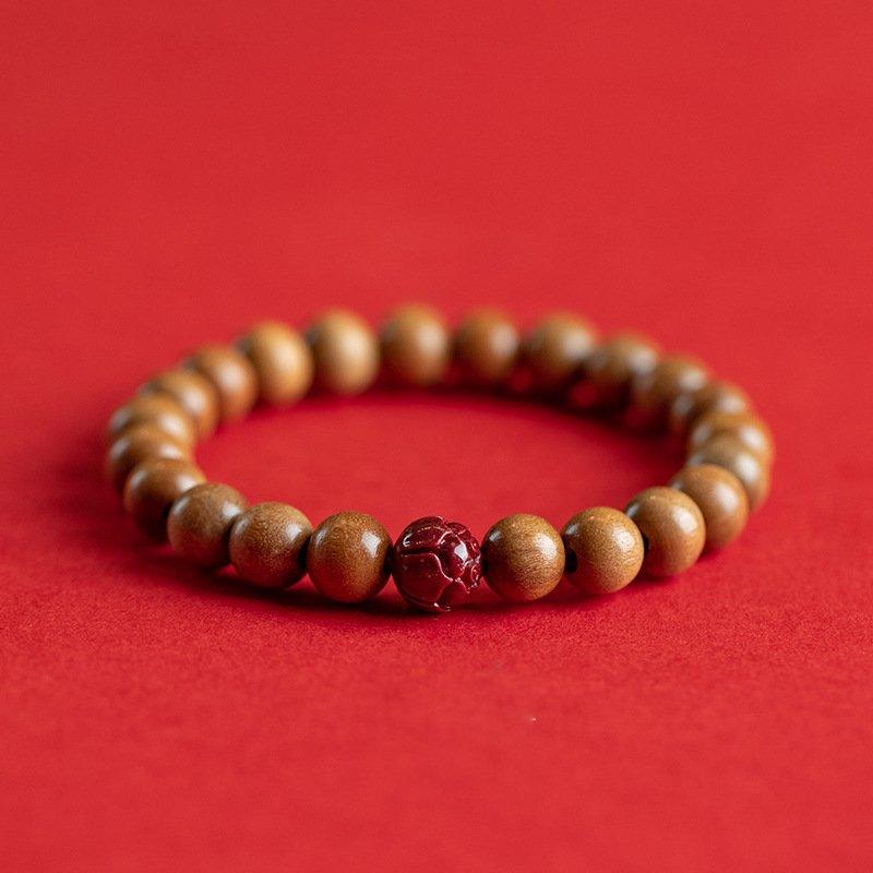 Peach Wood Lotus Cinnabar Bracelet - gloriouscollection