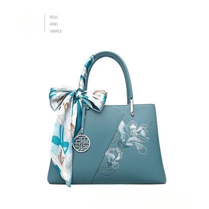 Elegant Magnolia Embroidered Genuine Leather Handbag